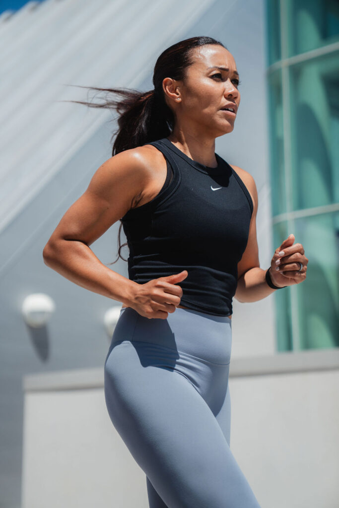 Maricris+SD-95 Maricris running past a modern building in San Diego